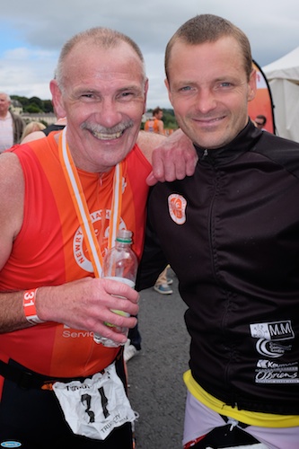 Newry athlete Tony Bagnall with Sean Featherstone, the first Newry competitor home in the 2014 firmus energy Newry City Triathlon. Sean from Newry Triathlon Club came third in the race. Photograph: Columba O'Hare