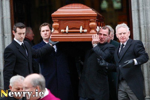 Lord Ballyedmond's remains are carried out of Newry Cathedral by his two sons Edward and James. Photograph: Columba O'Hare Lord Ballyedmond's remains are carried out of Newry Cathedral by his two sons Edward and James. Photograph: Columba O'Hare