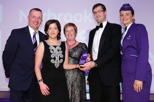 At the UTV Business Eye Awards with Flybe, Dr Vicky Kell, Invest NI, presents the International Award to Norbrook Laboratories represented by Roisin Hughes and Arran Rutledge. Also in the picture are Flybe cabin crew Ken Boyd and Natalie McSorley. At the UTV Business Eye Awards with Flybe, Dr Vicky Kell, Invest NI, presents the International Award to Norbrook Laboratories represented by Roisin Hughes and Arran Rutledge. Also in the picture are Flybe cabin crew Ken Boyd and Natalie McSorley.