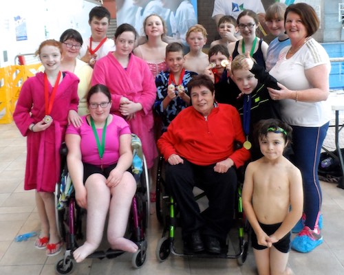 Members of Newry & Mourne Sportability pictured with Angela Hendra MBE