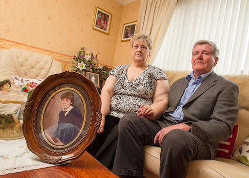 Barbara Graham  and her husband Ian with a picture of Caroline. Photograph: Newraypics