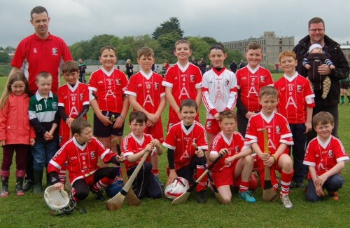 A Group of the Under 10 Craobh Rua hurlers pictured along with Coordinator Henry Mc Cloy & London visitors Conor and Baby Tomàs Mc Ginn A Group of the Under 10 Craobh Rua hurlers pictured along with Coordinator Henry Mc Cloy & London visitors Conor and Baby Tomàs Mc Ginn