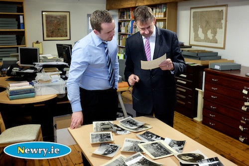 Shane McGivern, Newry Museum showing some of the photographs from the Donnelly Collection at Newry Museum to Éamon Ó Cuív TD, grandson of Eamon de Valera. Photograph: Columba O'Hare Shane McGivern, Newry Museum showing some of the photographs from the Donnelly Collection at Newry Museum to Éamon Ó Cuív TD, grandson of Eamon de Valera. Photograph: Columba O'Hare