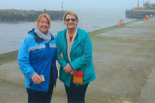 Carol and Valerie, pictured at Kilkeel Harbour along the part of the Harbour that their father had been involved in constructing Carol and Valerie, pictured at Kilkeel Harbour along the part of the Harbour that their father had been involved in constructing