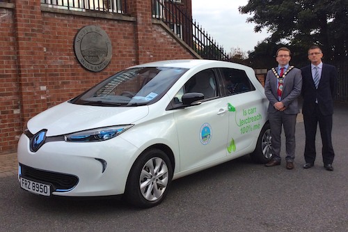 Mayor Daire Hughes with the Council's first electric car. Mayor Daire Hughes with the Council's first electric car.