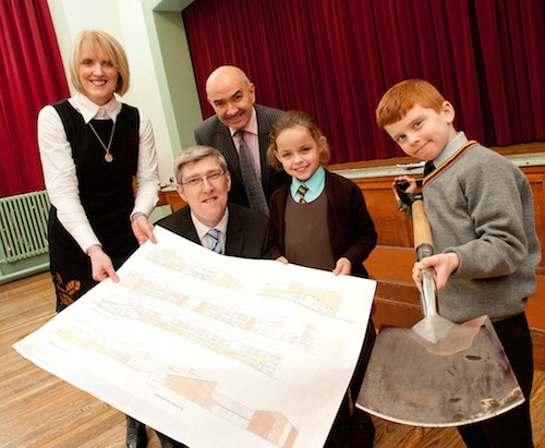 Minister John O'Dowd cut the first sod at the new St Clare's Abbey Primary School in Newry. Photographed with the Minister are Principal, Michelle Monaghan, Vice Principal Eddie Sweeney and pupils Juste and Owen. Minister John O'Dowd cut the first sod at the new St Clare's Abbey Primary School in Newry. Photographed with the Minister are Principal, Michelle Monaghan, Vice Principal Eddie Sweeney and pupils Juste and Owen.
