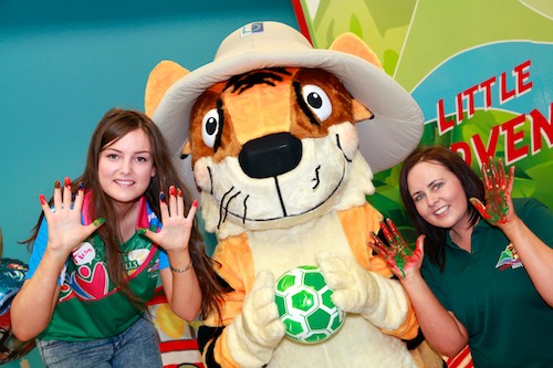 Caiomhe O Hagan, Michaela Foundation volunteer with Roary the Tiger and Sabrina McKeever, Manager South Armagh Childcare Consortium.