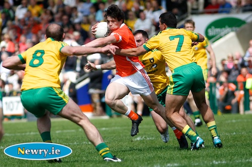 Armagh's James Morgan tries to break through the Donegal defence. Photograph: Columba O'Hare 