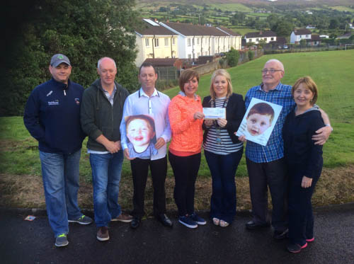 Cllr Naomi Bailie, Chairperson, Newry, Mourne and Down District Council with Cllr Roisin Mulgrew and members of the McCabe Family. Cllr Naomi Bailie, Chairperson, Newry, Mourne and Down District Council with Cllr Roisin Mulgrew and members of the McCabe Family.