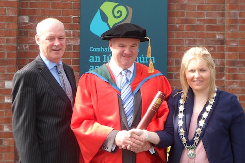 Dr John Farrell with Cllr Naomi Bailie, Chairperson, Newry, Mourne and Down District Council and Liam Hannaway, Chief Executive Newry, Mourne and Down District Council. Dr John Farrell with Cllr Naomi Bailie, Chairperson, Newry, Mourne and Down District Council and Liam Hannaway, Chief Executive Newry, Mourne and Down District Council.