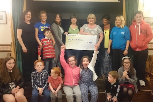 Autism Mums group with their cheque.