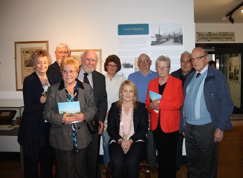 Naomi Bailie, Chairperson, Newry, Mourne and Down District Council with people who donated or loaned items to the exhibition Naomi Bailie, Chairperson, Newry, Mourne and Down District Council with people who donated or loaned items to the exhibition