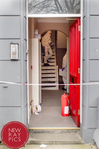 Forensic officers on the scene at Sandy Street. Photograph: NewRayPics Forensic officers on the scene at Sandy Street. Photograph: NewRayPics