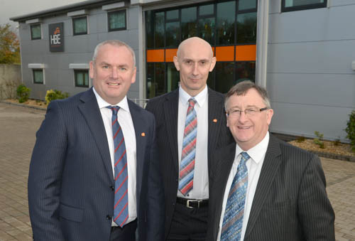 HBE Directors Adrian Byrne (left) and Pat McDonald are pictured with Damian McAuley (right) from Invest NI at the opening today of the new HBE offices in Newry. HBE Directors Adrian Byrne (left) and Pat McDonald are pictured with Damian McAuley (right) from Invest NI at the opening today of the new HBE offices in Newry.