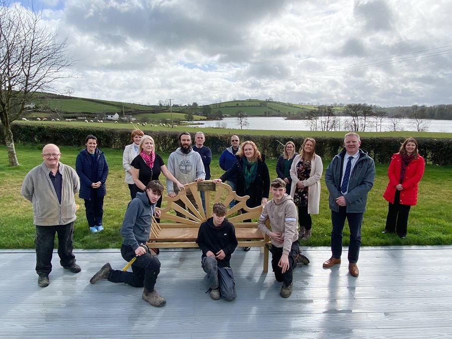 Pictured with the ‘Chatty Bench’, are Loughbrickland Social Enterprise Centre and New-Bridge Integrated College pupils, who designed and constructed the bench, alongside social workers from the Southern Health and Social Care Trust and other staff members. 