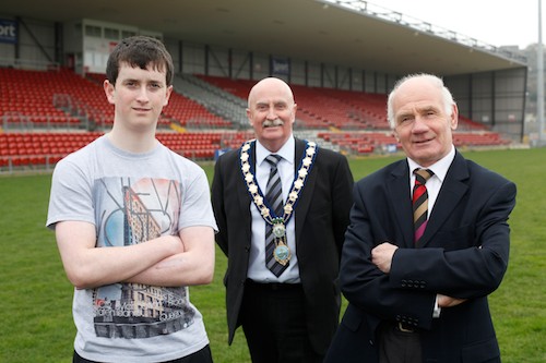 Willie McCracken and Ryan Cinnamond have been chosen as the Two Inspirational Tourch Bearers to carry the Olympic Flame when it arrives in Newry in June and they are pictured here with Mayor Charlie Casey at Pairc Esler where the Torch will arrive on the Fifth of June. Picture: Columba O'Hare