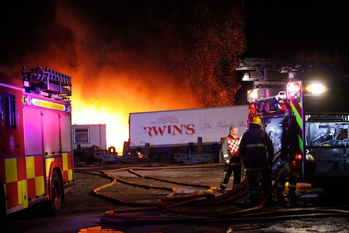 At least eight fire tenders worked on the fire at Newry Road, Mayobridge on Sunday night. Picture: Columba O'Hare At least eight fire tenders worked on the fire at Newry Road, Mayobridge on Sunday night. Picture: Columba O'Hare