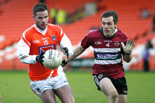 Armagh's Eugene McVerry gets away from Saint Mary's Eoin McArdle at the Morgan Athletic Grounds. Picture: Columba O'Hare