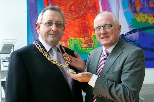 Newry surveyor Michael Hannaway is pictured with outgoing RICS NI chairman, Professor Alastair Adair.