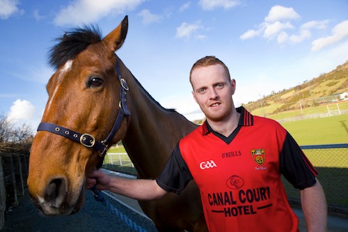 Down All-Star Brendan Coulter leads from front into the home straight as he launches Down GAA Race Day 2011. Photo: Darryl Mooney 