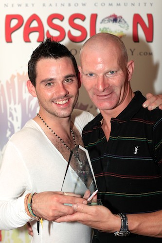 Newry man Padraig Lynch, right, was crowned Mr Gay Newry 2010 on Saturday night at Passion in the Brass Monkey and he is pictured receiving his award from Jason Masterson, Former Mr Gay Ireland.