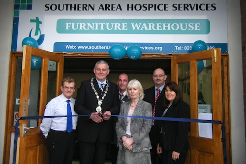 Alan McCartney (Shops Manager), Mayor Coleman Burns, Shane Jones (Warehouse Supervisor), Ann Cooney (Chief Executive), Donal Fegan (Newry Shop Supervisor), Bernadette McGuinness (Accountant) open the shop Alan McCartney (Shops Manager), Mayor Coleman Burns, Shane Jones (Warehouse Supervisor), Ann Cooney (Chief Executive), Donal Fegan (Newry Shop Supervisor), Bernadette McGuinness (Accountant) open the shop