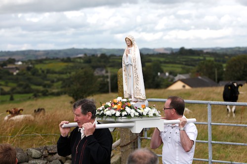 Carrying the statue of the Virgin Mary during the procession at the traditional Latin Mass at Ballyholland Mass Rock. Photo: Columba O'Hare