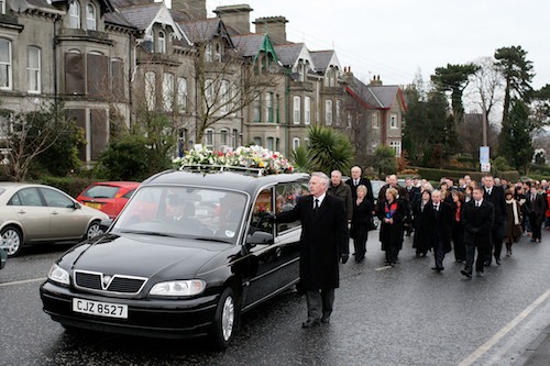 Maire Rankin's Funeral passes her house on the Dublin Road. Photo: Columba O'Hare