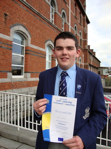 John Devlin, Head Prefect of St. Colman’s College with his award