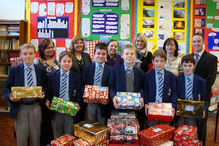Pupils are pictured with Ms Carol Elliot District Co-ordinator of Samaritans Plus and the five teachers involved:  Mrs Eva Freeburn, Miss Orla Cunningham, Miss Patricia Farmer, Mrs Paula Somerville and Mr Mark Doran
