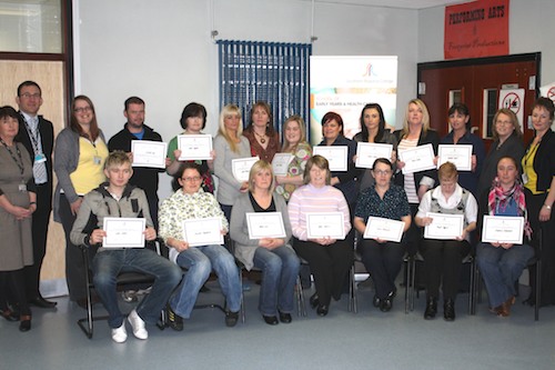 Southern Area Health and Social Care Workers receive their certificates for the Technical Certificate in Health and Social Care. Photo includes: Maggie Grant (Head of School Early Years and Health Care, SRC), Justin Edwards (Director of Curriculum and Student Services, SRC), Joanne Wilson, (NVQ assessor within the Trust), Anna Shortt, (Deputy Head of School for Early Years & Health Care at SRC) and Mairead McGarvey (NVQ coordinator, SRC)