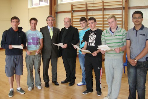 Dr. Brown and the new principal, Mr Cormac McKinney with the students. Dr. Brown and the new principal, Mr Cormac McKinney with the students.