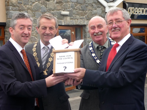 Councillor William Dick Chairman of Down District Council, Mr. John McGrillen Chief Executive Down District Council, Mr. Thomas McCall Chief Executive Newry and Mourne District Council and Deputy Mayor of Newry and Mourne District Council Charlie Casey.