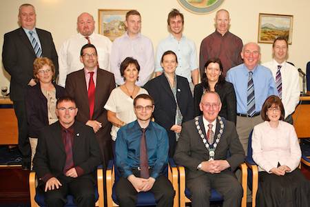 Pictured at the Civic Reception for the Newry Rainbow Community were front from left: Damian McKevitt, Secretary, NRC; Blaine Whitley, Chairman, NRC; Cllr John Feehan, Mayor of Newry and Mourne and Regina Mackin, Assistant Director of Administration, Equality Unit, Newry and Mourne District Council. Middle row: Cllr Josephine O'Hare; Columba O'Hare, NRC; Hilary Halliday, P.R.O, Newry and Mourne District Council; Sarah Nesbit, External Good Relations Officer, Newry and Mourne District Council; Nicola Doran, Health Inequalities Officer, Newry and Mourne District Council; Dermot Mooney, NRC and Gary O'Rourke, Treasurer, NRC. Back: Colin Moffett, Equality Officer, Newry and Mourne District Council; Andrew Kernaghan, Internal Good Relations Officer, Newry and Mourne District Council; David McArdle, NRC; Jai Burke, NRC and Padraig Lynch, NRC. NRC Civic Reception