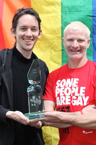 John Ruddy from Dundalk Outcomers and Padraig Lynch from Newry Rainbow Community with the trophy the groups won for the Best Float at the Dublin Pride Parade.