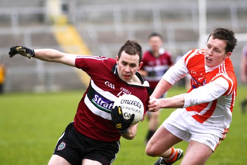 Armagh's Declan McKenna hounds Saint Mary's Niall Sludden at the Athletic Grounds. Picture: Columba O'Hare