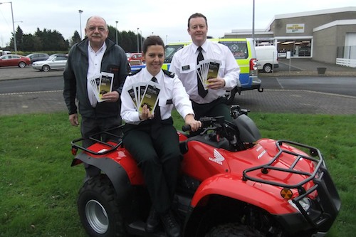Pictured are Mr Jim Millsopp, Sales Manager, Allens Honda, Constable Bill Holden, PSNI Roads Policing, and Constable Gemma Priestley, PSNI Youth Diversion Officer, at the launch of the Ride Safe leaflet. 