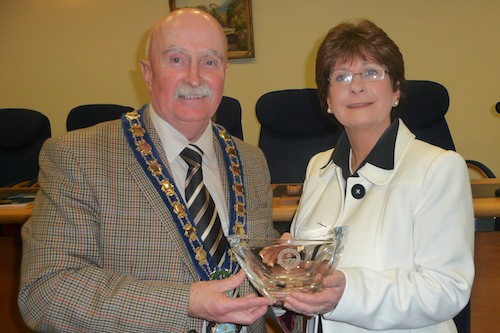 Mayor Charlie Casey makes a presentation to Saint Mary's Principal, Margo Cosgrove.