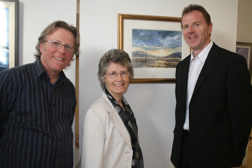  Mavis O'Connor from Warrenpoint, attended Recreational Art Class.  Title of her piece is 'Evening Sail - Carlingford Lough'. Mavis is pictured with tutor Nigel Whiteside and David Vint, Assistant Director Community & School Partnerships