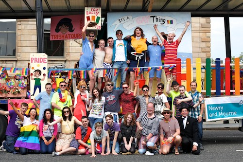 Members of Newry Rainbow Community and Dundalk Outcomers in happy form in front of their float at Belfast Pride on Saturday.