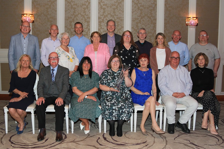 District Electoral Area (DEA) Forum representative, Councillor Charlie Casey with representatives from the Newry Neighbourhood Renewal Partnership. Included front from left: Catherine Mc Inerney, Member of DEA Forum, Councillor Valerie Harte Newry DEA, Paula McGuigan Chairperson of Newry Neighbour Renewal Partnership, Noreen Rice DEA, Colin Hanna Vice Chairperson Newry Neighbour Renewal Partnership, Catherine O'Hanlon Department of Communities. Back from left:  Councillor Michael Savage, Sean McKevitt Newry Neighbour Renewal Partnership Co-ordinator, Donna Weir Education Authority Youth Service, Aidan McCabe Southern Health and Social Care Trust, Joanne Fegan Carnagat Community Association, Raymond Jackson Confederation of Community Groups, Josie McGivern Carnagat Community Association, John Stewart C.R.J, Kerri Morrow DEA Co-ordinator, Martin Connell Newry Neighbour Renewal Health and Well-Being, Francie McGuigan Carnagat Community Association.