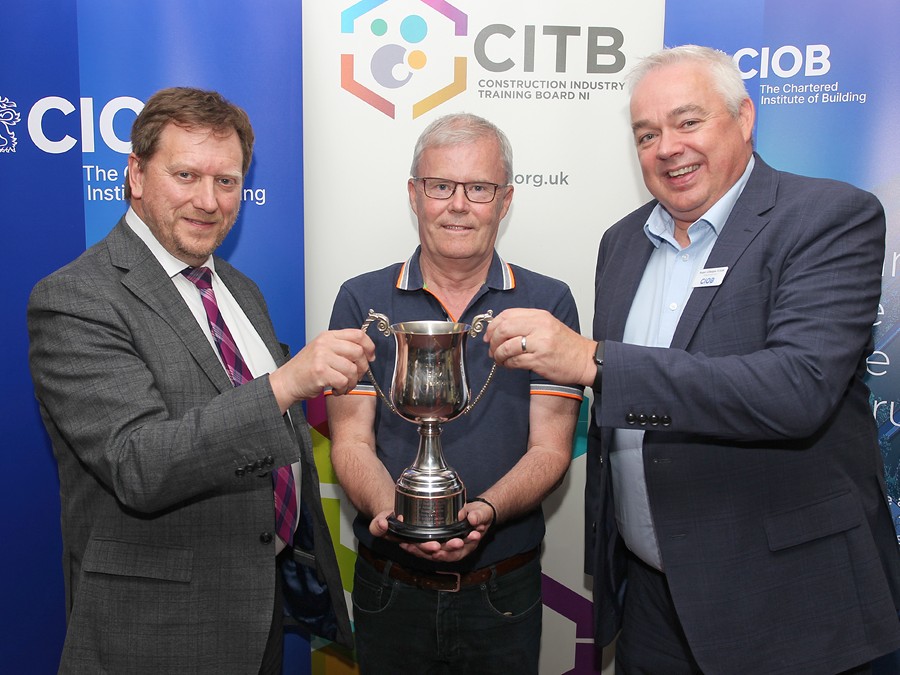 Celebrating success at the recent CIOB & CITB NI Student Achievement Awards were, from left, Barry Neilson, Chief Executive CITB NI, Eamon Nogher from Felix O’Hare who received the Best Chartered Membership Programme (CMP) student in Ireland 2021/2022 and Roger Gillespie, Chair of CIOB Belfast Hub.