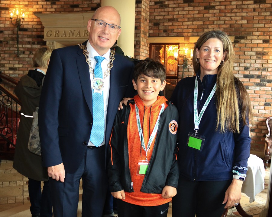Newry, Mourne and Down District Council Chairperson, Councillor Michael Savage meets the youngest member of the Treinfhir family gathering, 11 year old Steven Treanor with his mum Coury all the way from New York.