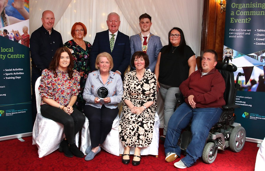 Newry, Mourne and Down District Council former Chairperson, Councillor Michael Rice pictured with Members of the Three Ways Community Association and Lifetime Achievers Award winner Patricia O’Gorman who received the award for displaying high levels of voluntary achievement over 25 years.