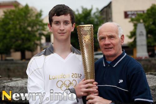 Ryan Cinnamond and Willie McCracken prepare to carry the Olympic Torch this evening. Picture: Columba O'Hare