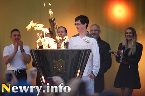 Ryan Cinnamond lights the Olympic Cauldren at Pairc Esler. Picture: Columba O'Hare