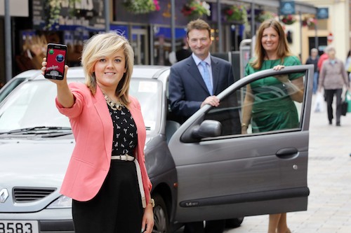 Student driver Aisling Dinsmore, Richard Jelbert from MyDrive Solutions and Julie Gibbons from Autoline Insurance Group check out the App