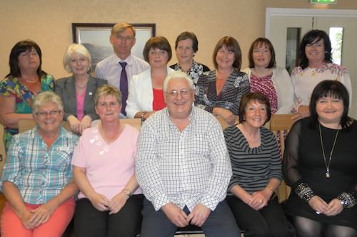 Pictured: (Back row, left to right: Eileen Kerr (Staff Nurse), Ann Cooney (CEO), Dr Osmond Morris (Medical Director), Jacqueline McAteer (Staff Nurse), Bernie Duncan (Staff Nurse), Angela McCartney (Staff Nurse), Bernie Ferris (Staff Nurse), Angela Fegan (Nursing Auxiliary) Front row left to right: Betty Finnegan (Fundraising Finance), Sheila McGivern (Receptionist), Alan O’Hare (Maintenance Manager – retired June 2012), Kate Hughes (Staff Nurse – retired 2012), Maureen O’Hare (Support Services Manager). 