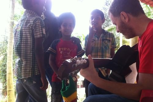 David entertains the Children with a song.