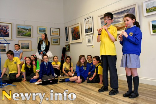 Bunscoil an Iúir pupils providing the entertainment at the Newry Library re-opening. Picture: Columba O'Hare